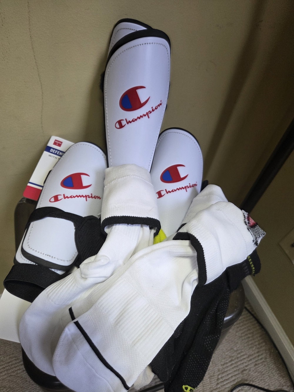 Champion White Shin Guards with Red & Blue Logos and White Athletic Socks
